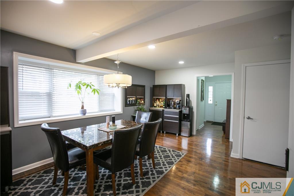 4308 Hana Road Edison, NJ 08817 - Photo 3 of 32 a view of a dining room with furniture