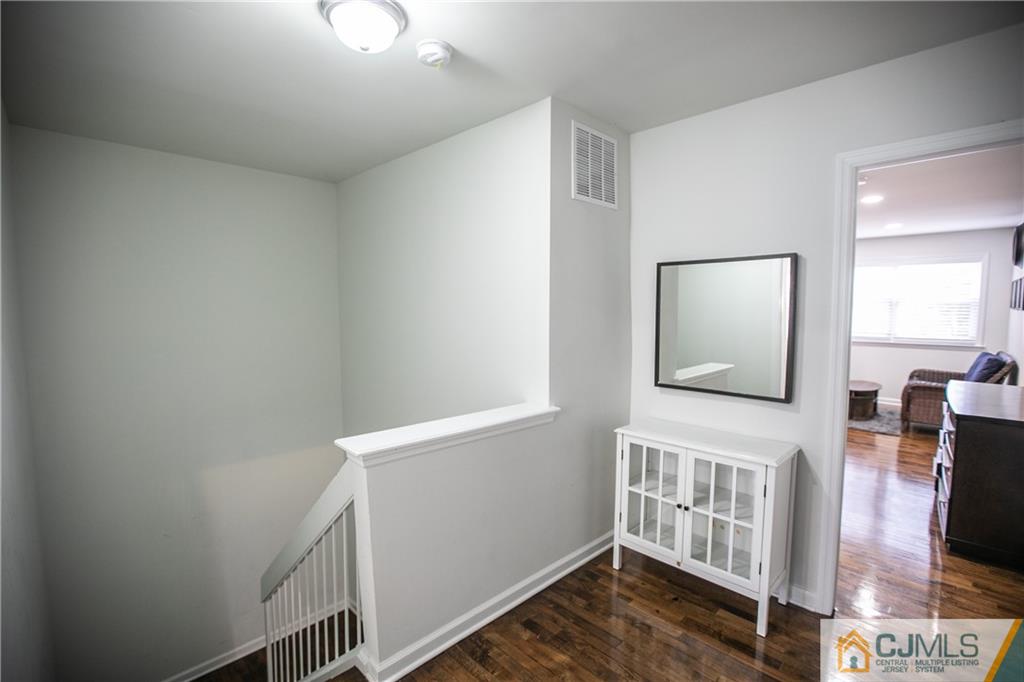4308 Hana Road Edison, NJ 08817 - Photo 32 of 32 a view of an entryway with wooden floor