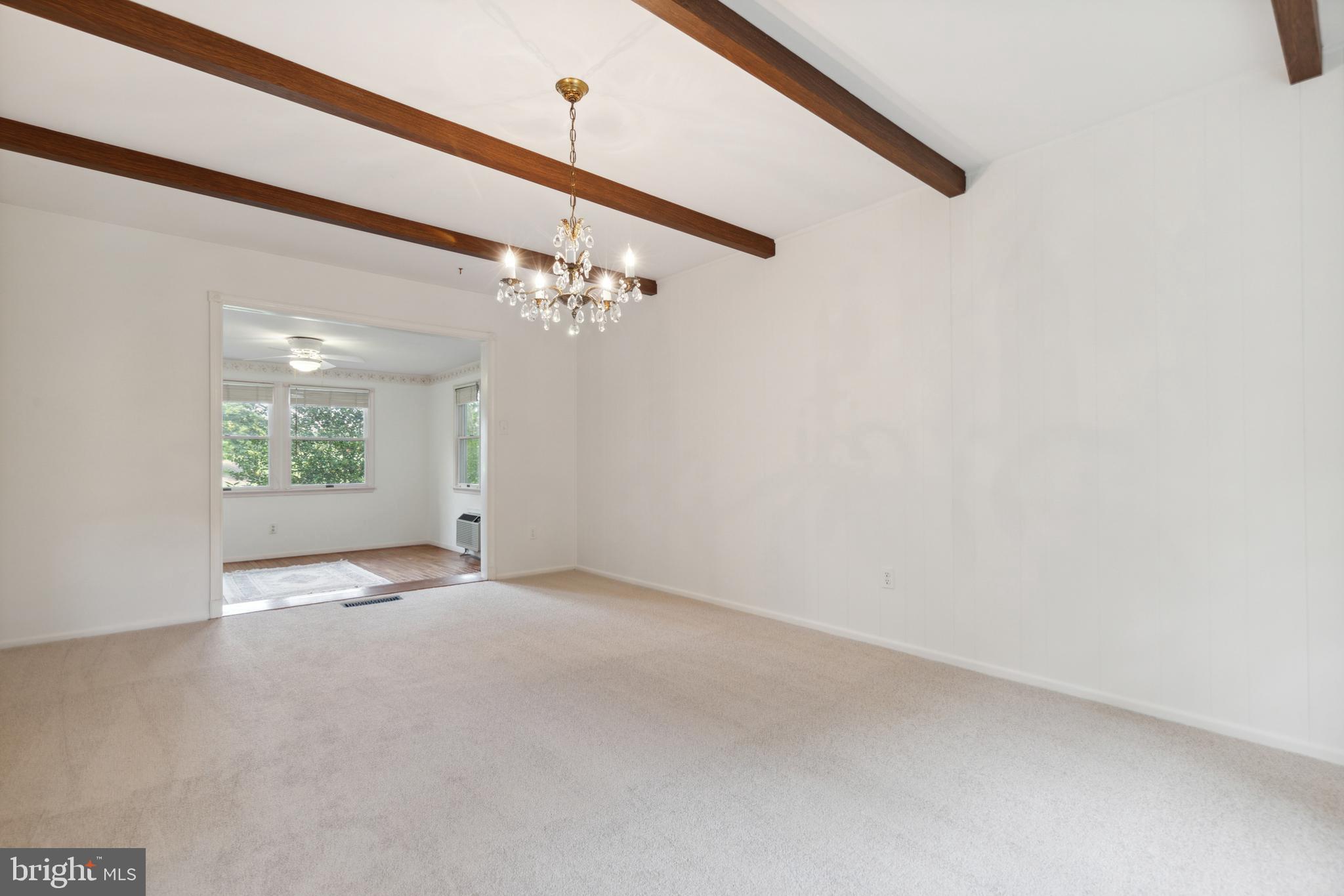 6715 Bellamy Avenue Springfield, VA 22152 - Photo 11 of 52 Formal DR opening to sunroom
