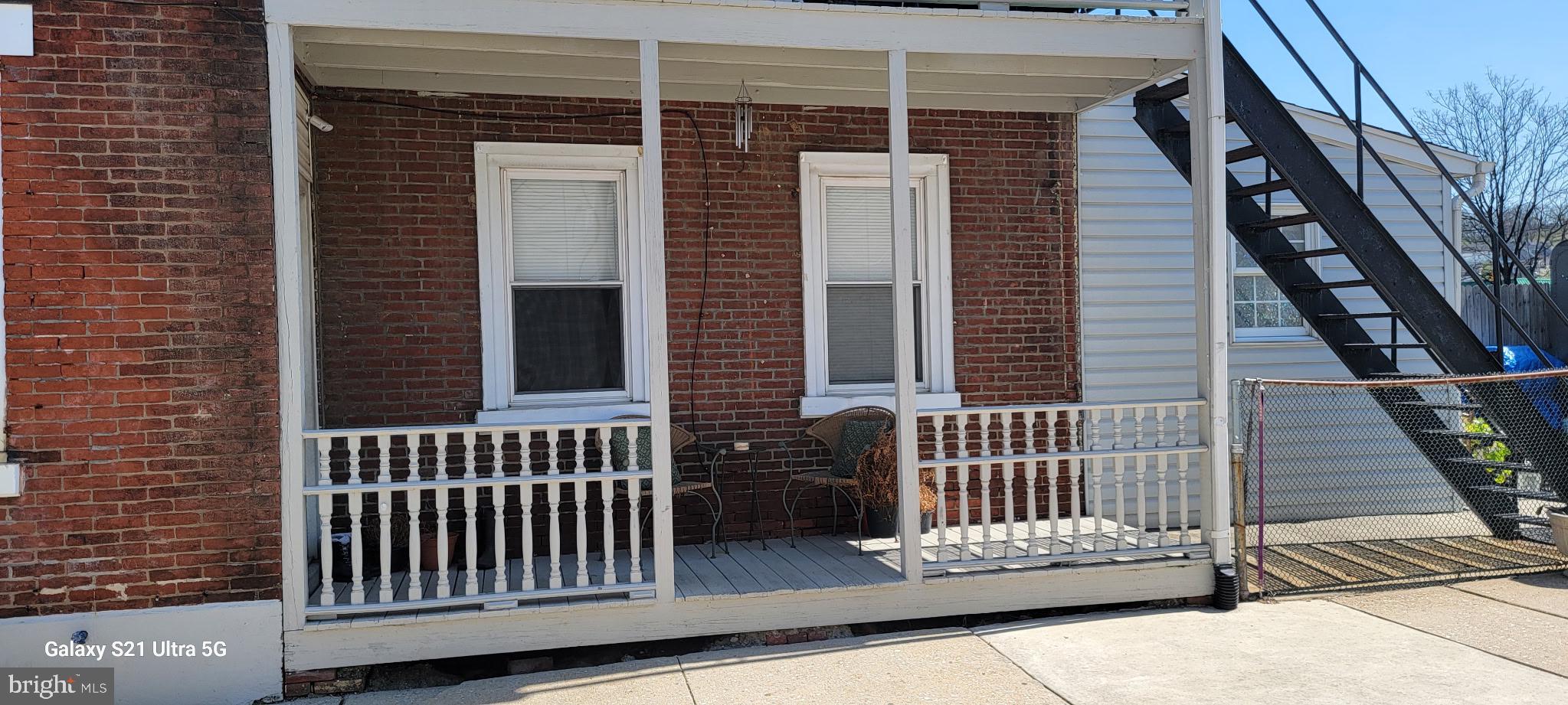 138 3rd Street, Unit 1 Bridgeport, PA 19405 - Photo 2 of 9 a view of a deck with a door