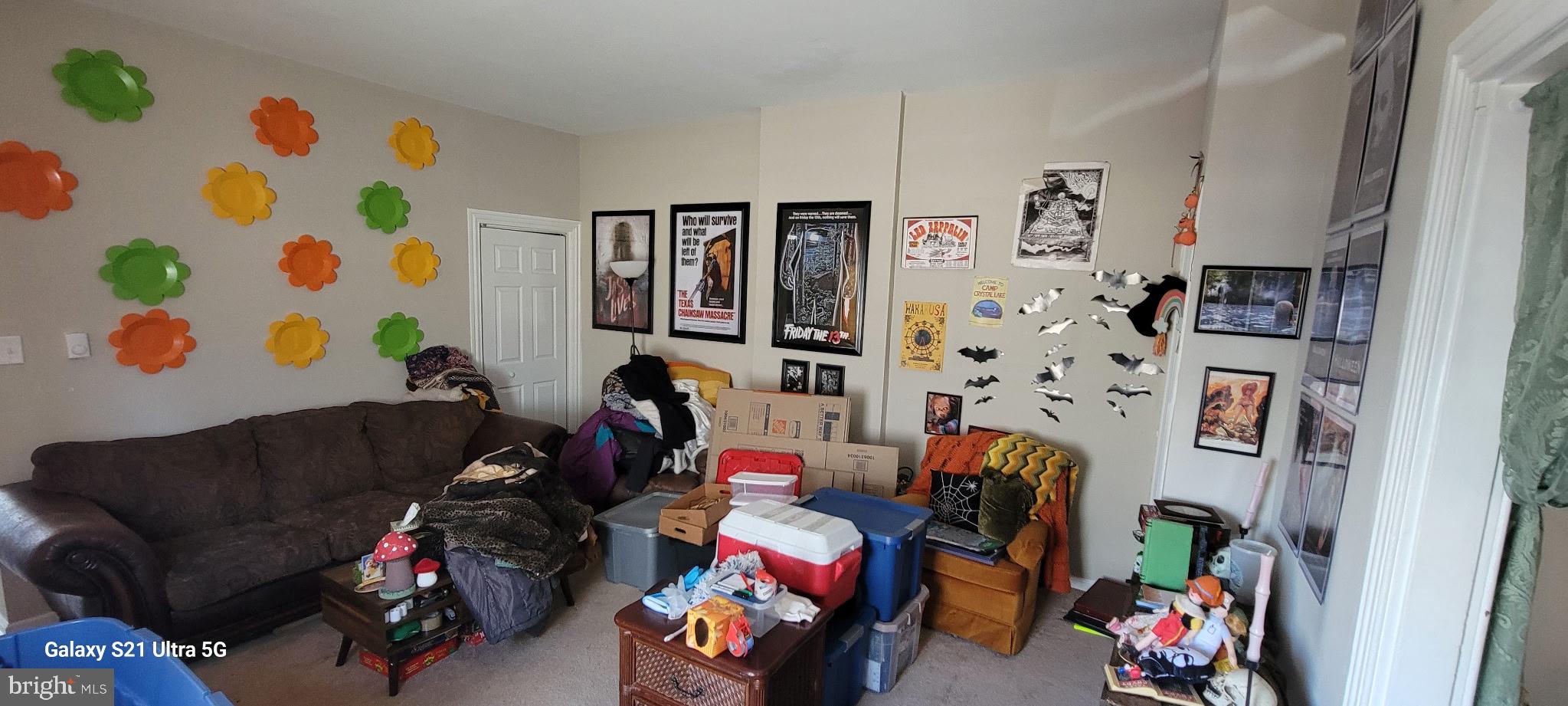 138 3rd Street, Unit 1 Bridgeport, PA 19405 - Photo 5 of 9 a living room with lots of furniture and baby couch