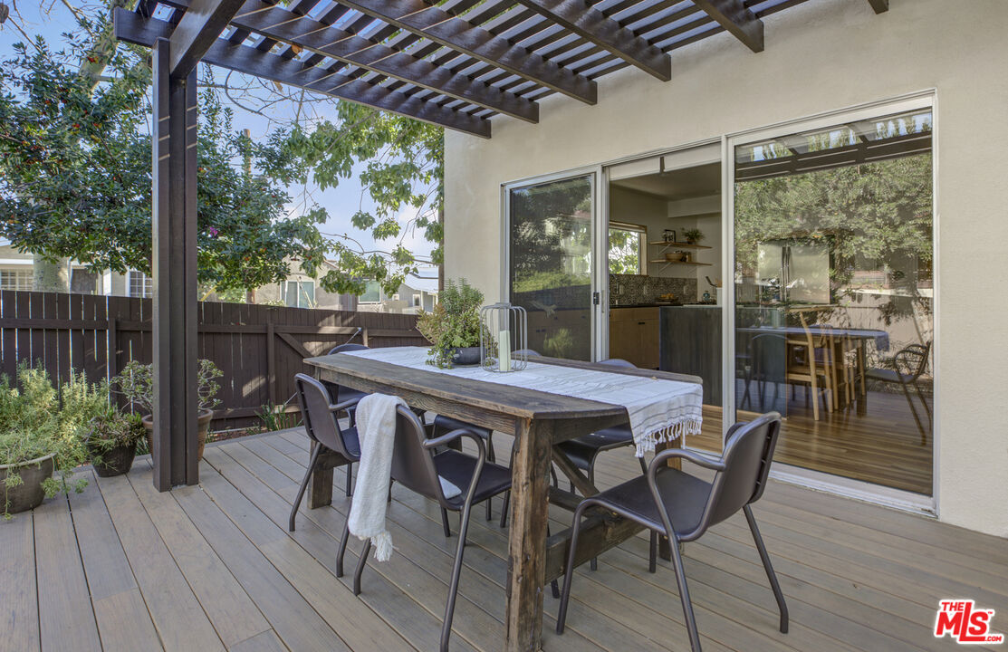 5740 Meridian Street Los Angeles, CA 90042 - Photo 27 of 50 a patio with table and chairs