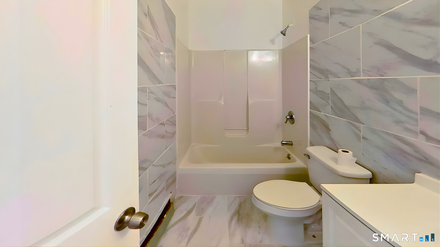 72 Chestnut Street, Unit 6 Norwalk, CT 06854 - Photo 11 of 14 a bathroom with a toilet and a shower