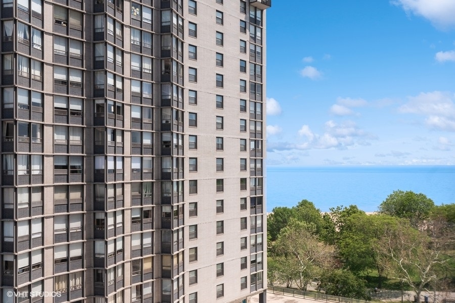 5701 North Sheridan Road, Unit 9L Chicago, IL 60660 - Photo 14 of 17 a view of a city with tall buildings