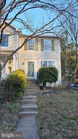 a view of a yard in front of a house