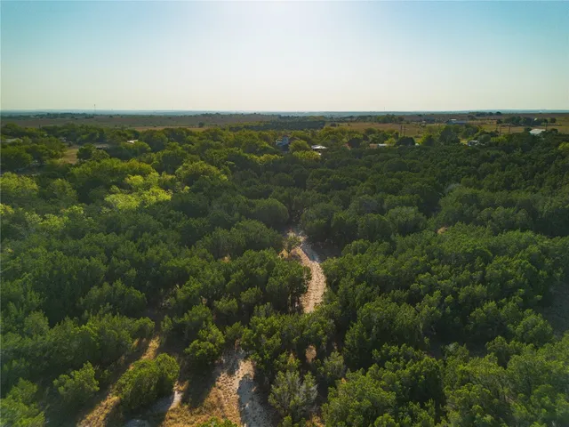 a view of a lake with a city