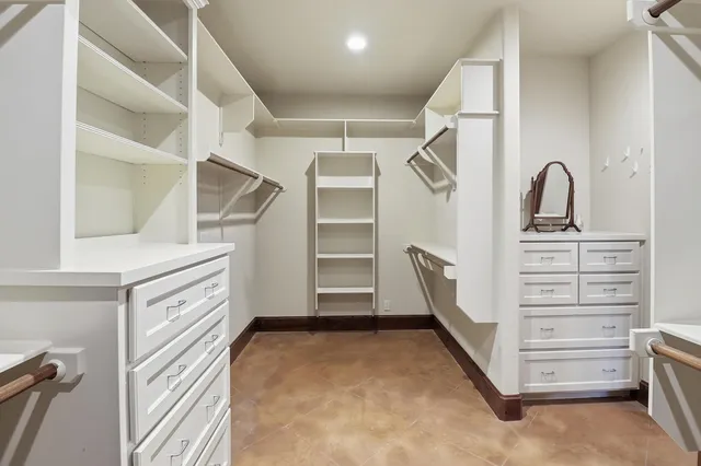 a view of an empty walk in closet