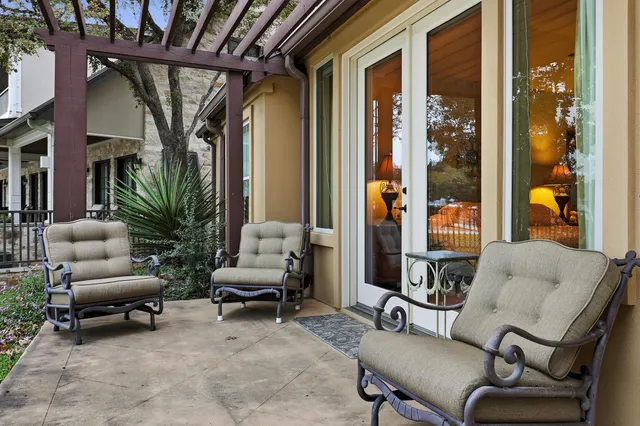 a outdoor living space with furniture and a potted plant