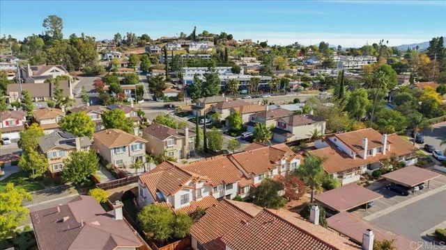 an aerial view of a city with lots of residential buildings