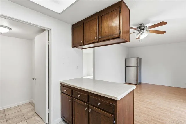 a kitchen with a cabinets and appliances