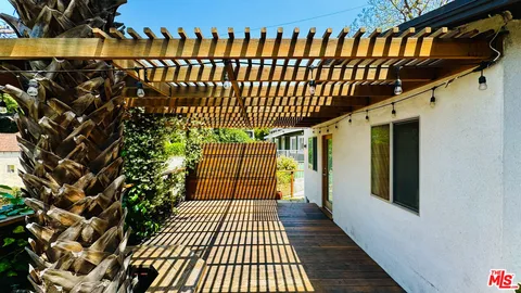 a view of a house with a street