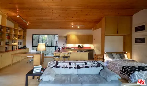 a living room with furniture and a couch