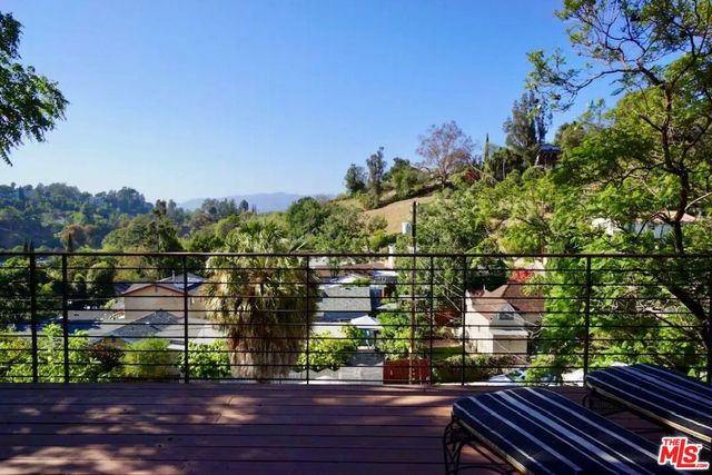 a view of a city from a balcony