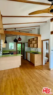 a kitchen with stainless steel appliances a stove and a refrigerator