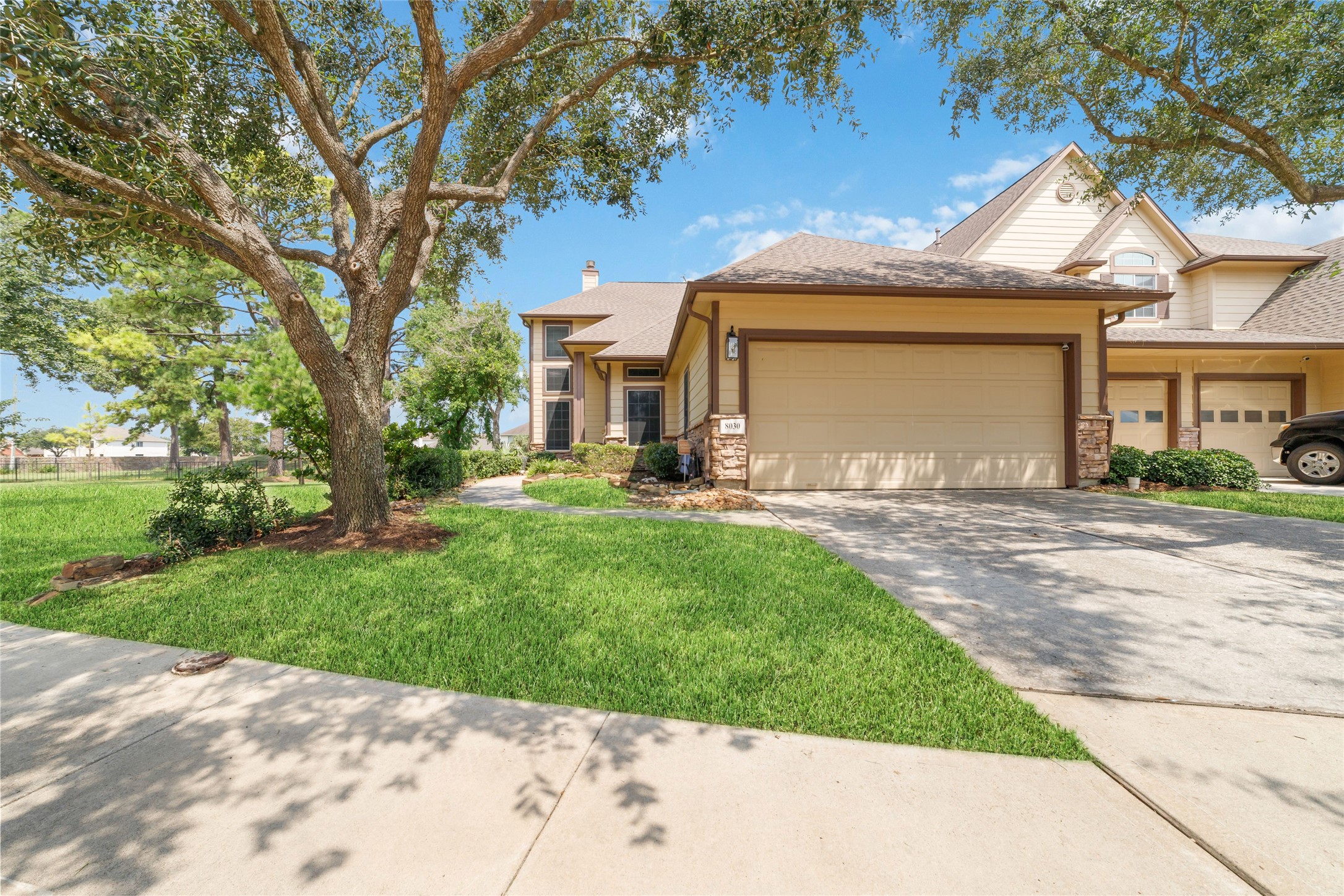 8030 Loyel Pointe Drive Houston, TX 77064 - Photo 4 of 27 a front view of a house with a yard and road