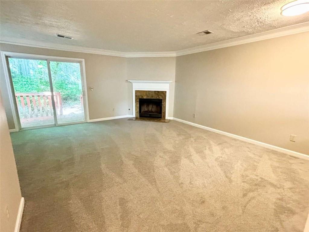 3774 Meadow Creek Drive, Unit 3774 Norcross, GA 30092 - Photo 3 of 29 a view of an empty room with a window