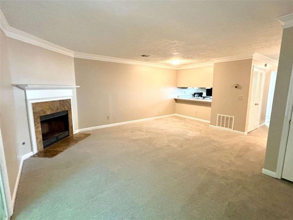 3774 Meadow Creek Drive, Unit 3774 Norcross, GA 30092 - Photo 4 of 29 a view of empty room with a fireplace