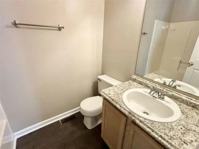 a bathroom with a sink and a toilet