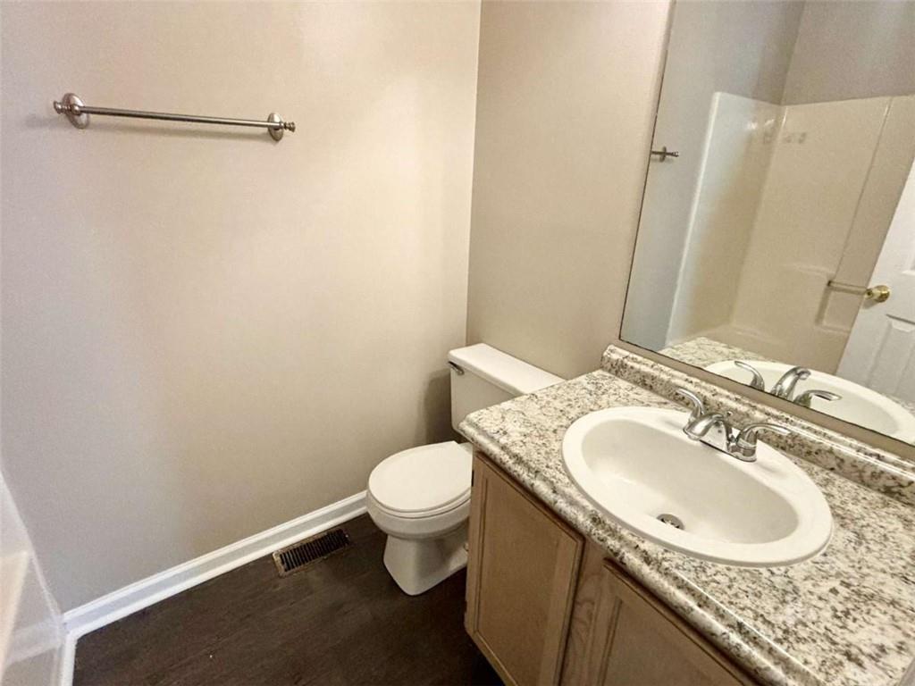 3774 Meadow Creek Drive, Unit 3774 Norcross, GA 30092 - Photo 10 of 29 a bathroom with a sink and a toilet