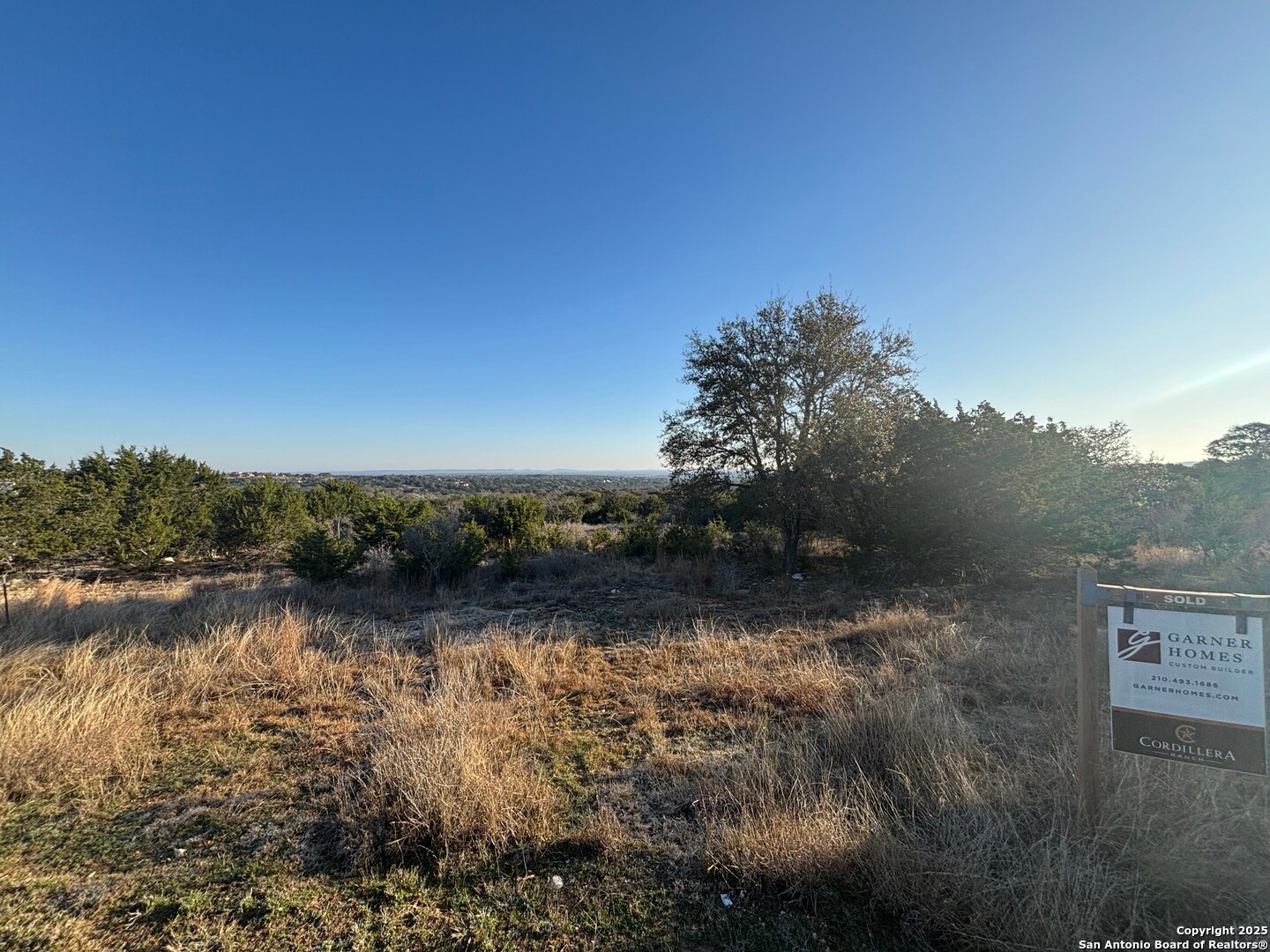 4 Meridian Boerne, TX 78006 - Photo 6 of 13 a view of a lake with houses in the back