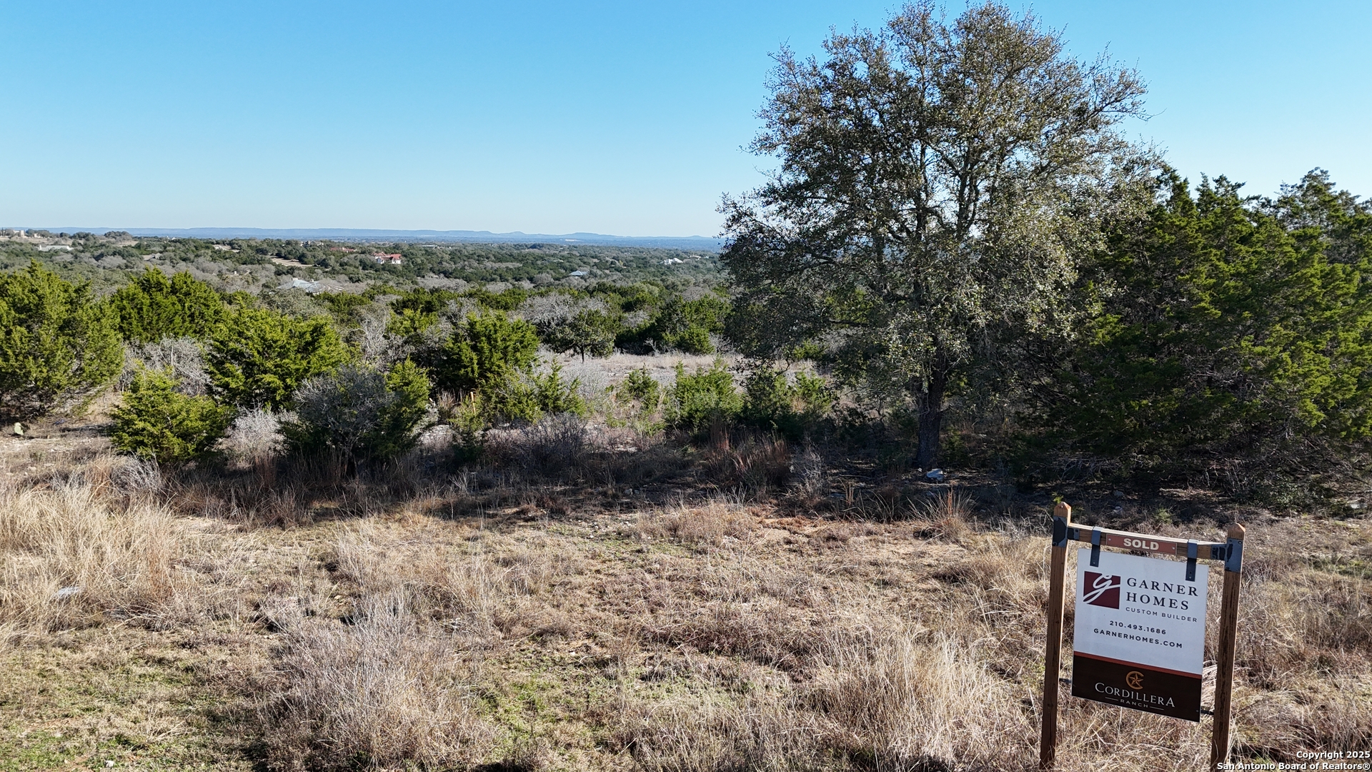 4 Meridian Boerne, TX 78006 - Photo 10 of 13 a view of a yard with wooden fence