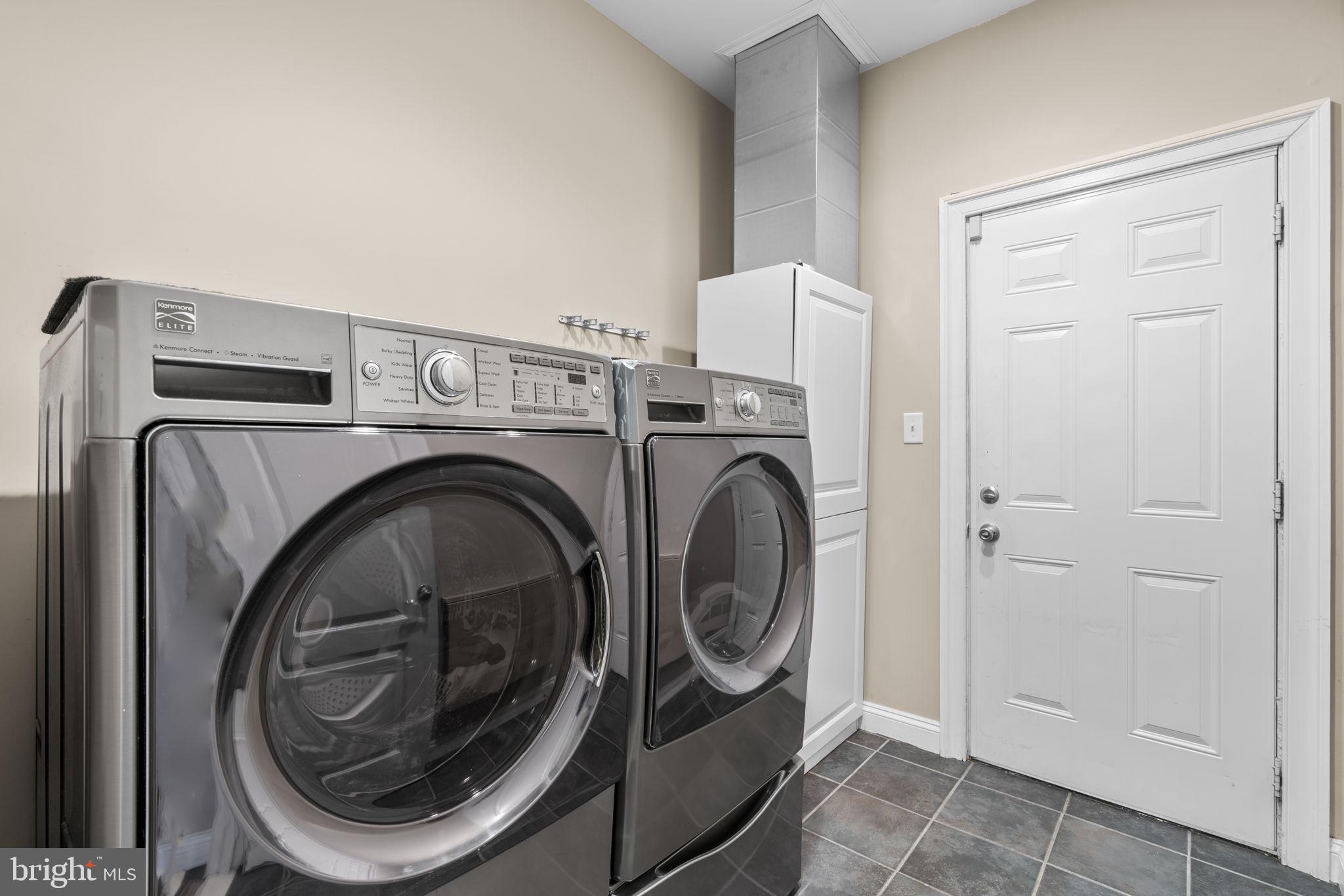 8024 Solley Road Glen Burnie, MD 21060 - Photo 47 of 83 a utility room with dryer and washer