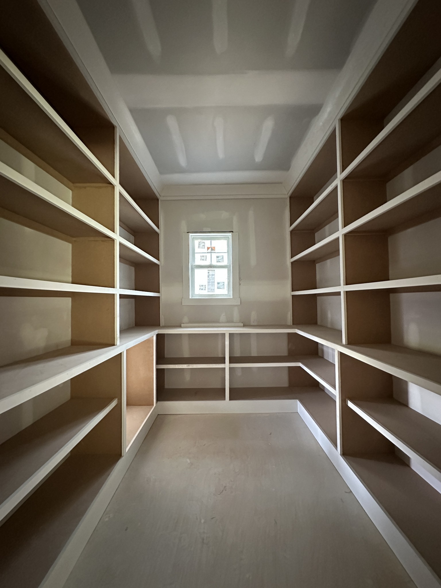 49 Copperas Creek Road Tullahoma, TN 37388 - Photo 12 of 19 a view of an empty room with empty shelves