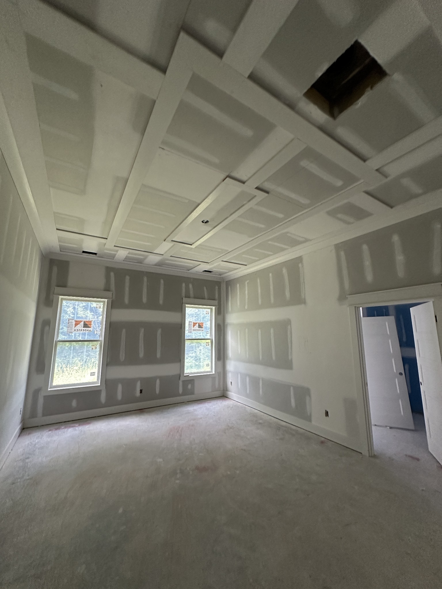 49 Copperas Creek Road Tullahoma, TN 37388 - Photo 14 of 19 an empty room with windows