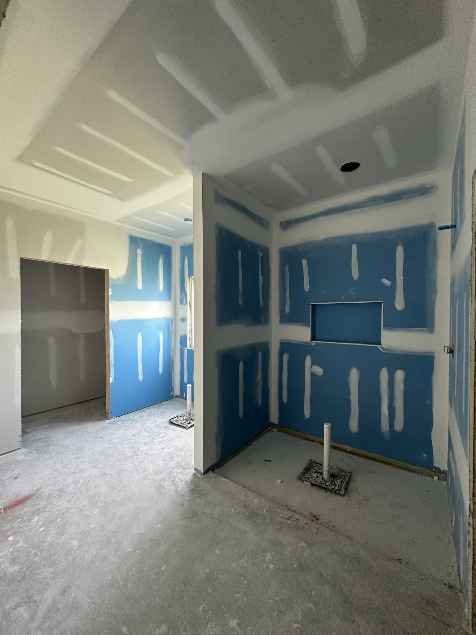 49 Copperas Creek Road Tullahoma, TN 37388 - Photo 15 of 19 an empty room with a fireplace and cabinets