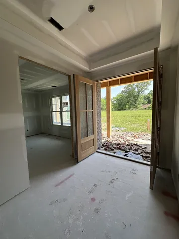 a view of an empty room and window