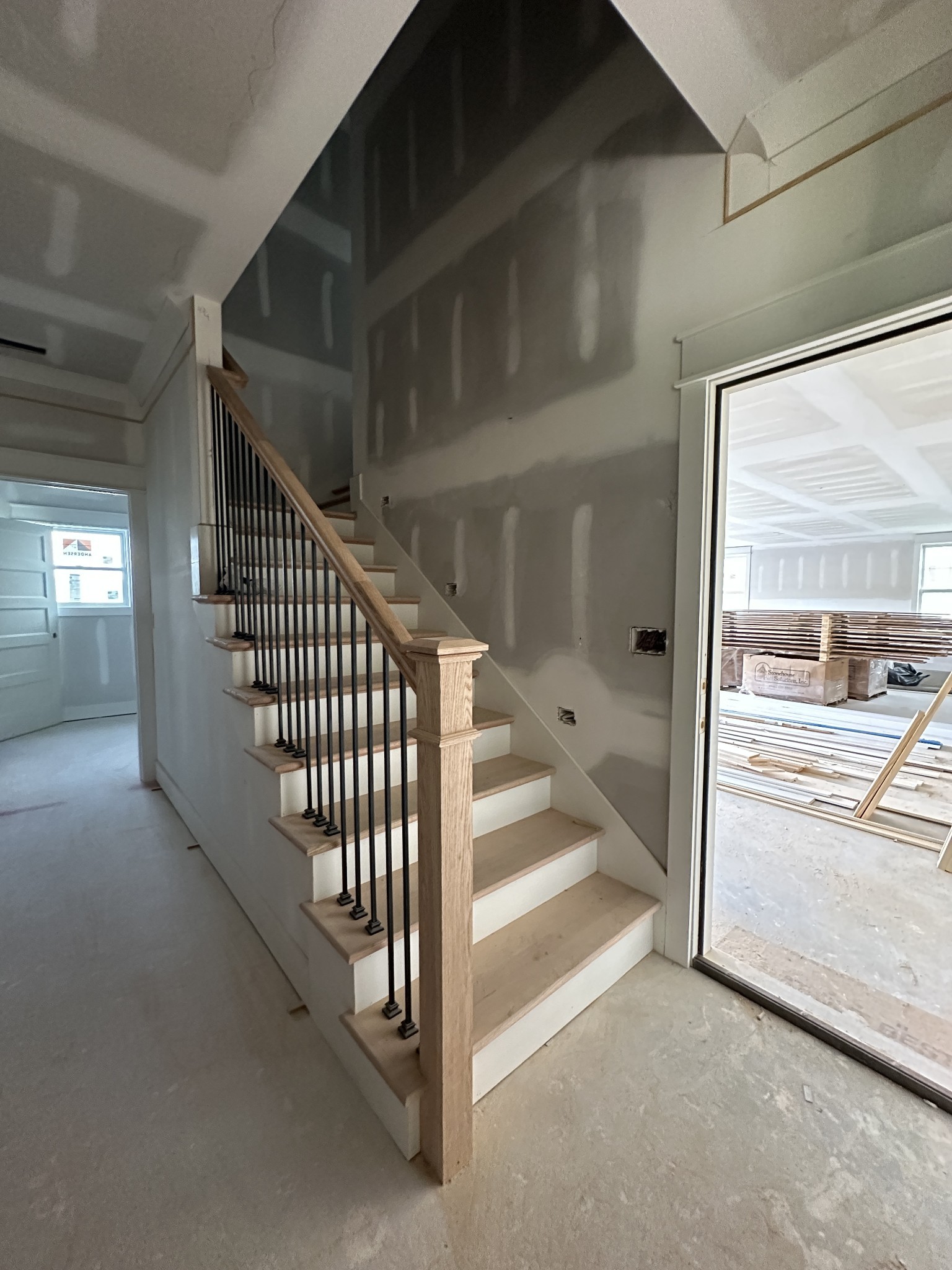 49 Copperas Creek Road Tullahoma, TN 37388 - Photo 5 of 19 a view of a hallway with windows and stairs
