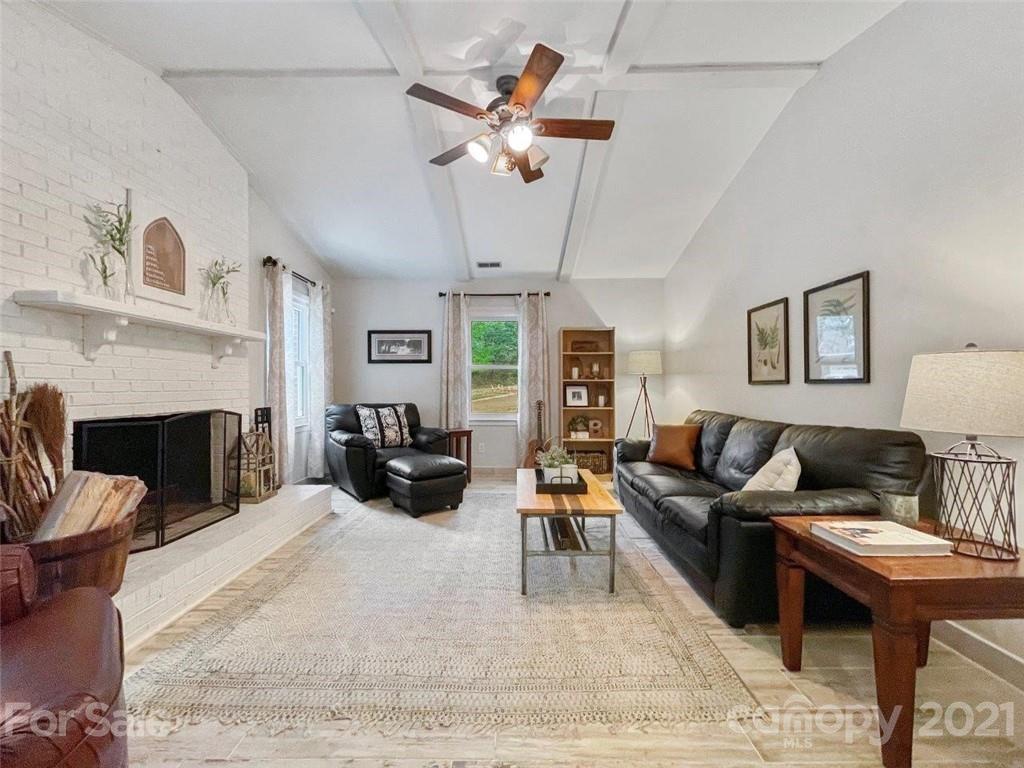 733 Neill Ridge Road Matthews, NC 28105 - Photo 14 of 30 a living room with furniture fireplace and window