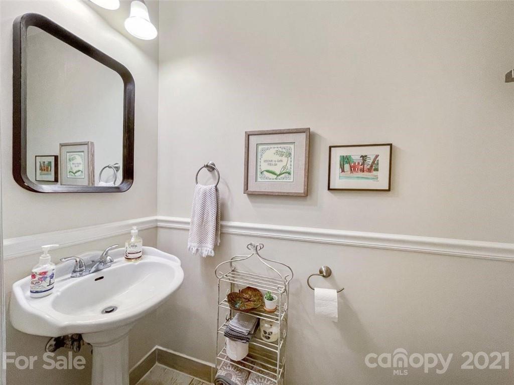 733 Neill Ridge Road Matthews, NC 28105 - Photo 15 of 30 a bathroom with a sink and a mirror