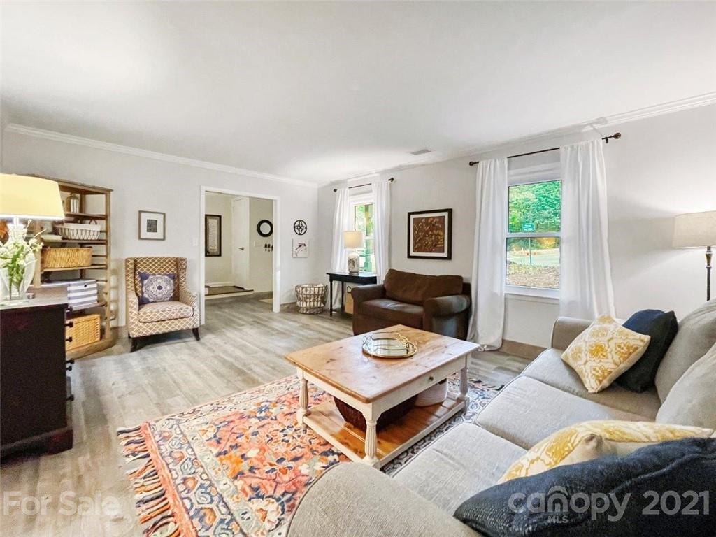 733 Neill Ridge Road Matthews, NC 28105 - Photo 4 of 30 a living room with furniture rug and window