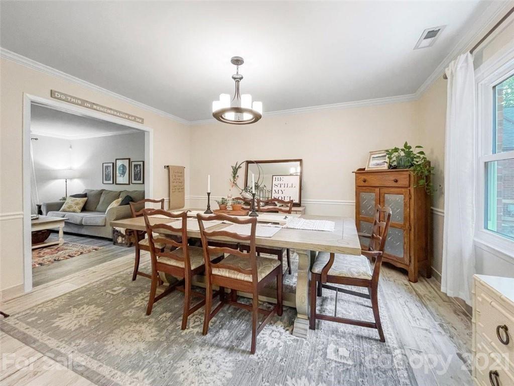 733 Neill Ridge Road Matthews, NC 28105 - Photo 6 of 30 a view of a dining room with furniture
