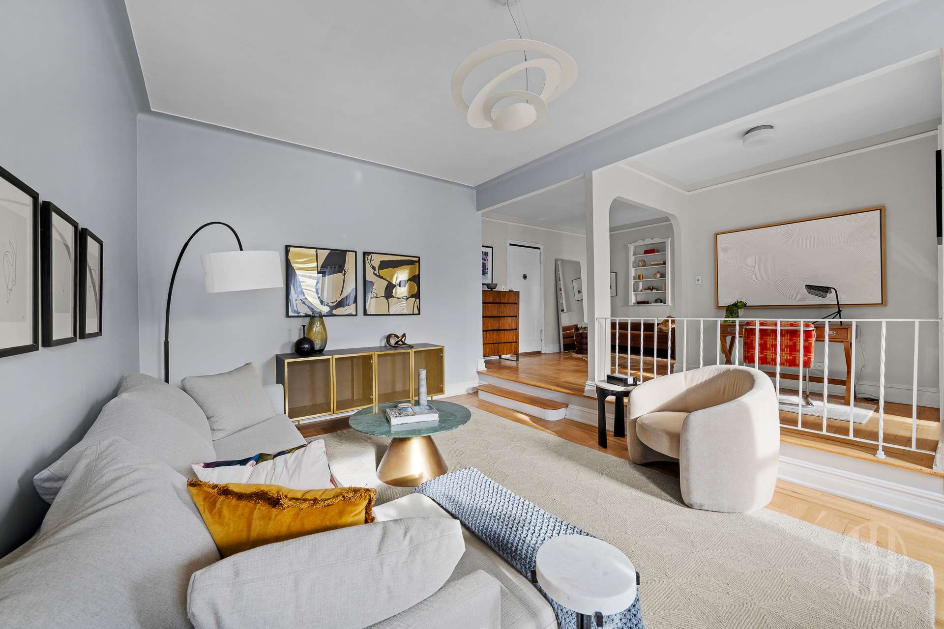 55 Eastern Parkway, Unit 6B Brooklyn, NY 11238 - Photo 2 of 9 a living room with furniture and a large window