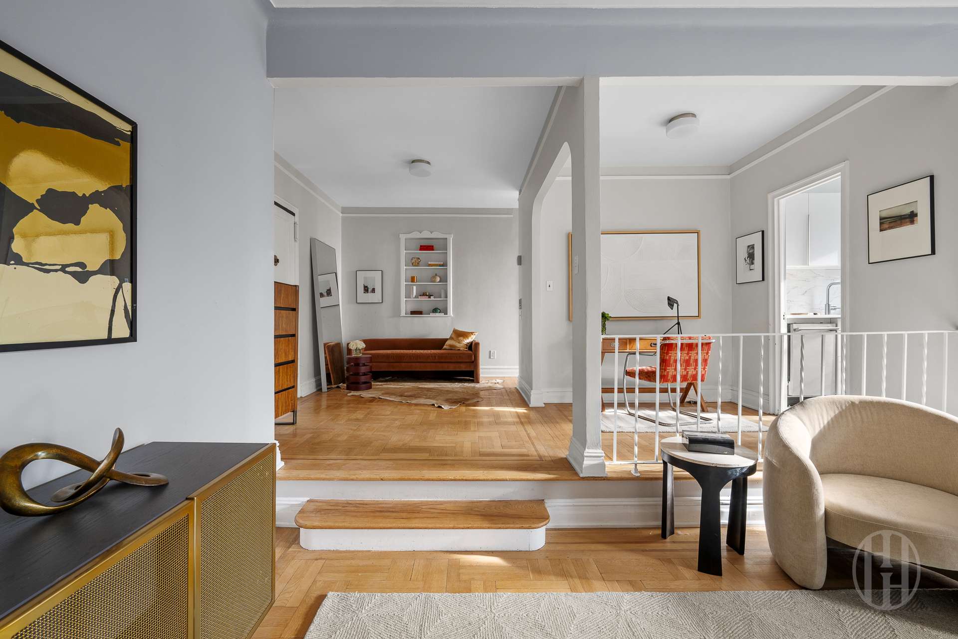55 Eastern Parkway, Unit 6B Brooklyn, NY 11238 - Photo 3 of 9 a living room with furniture and a book shelf