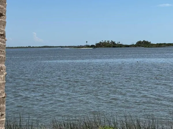 a view of a lake from a balcony