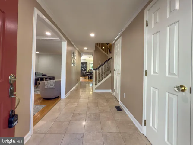 a view of a hallway with seating area