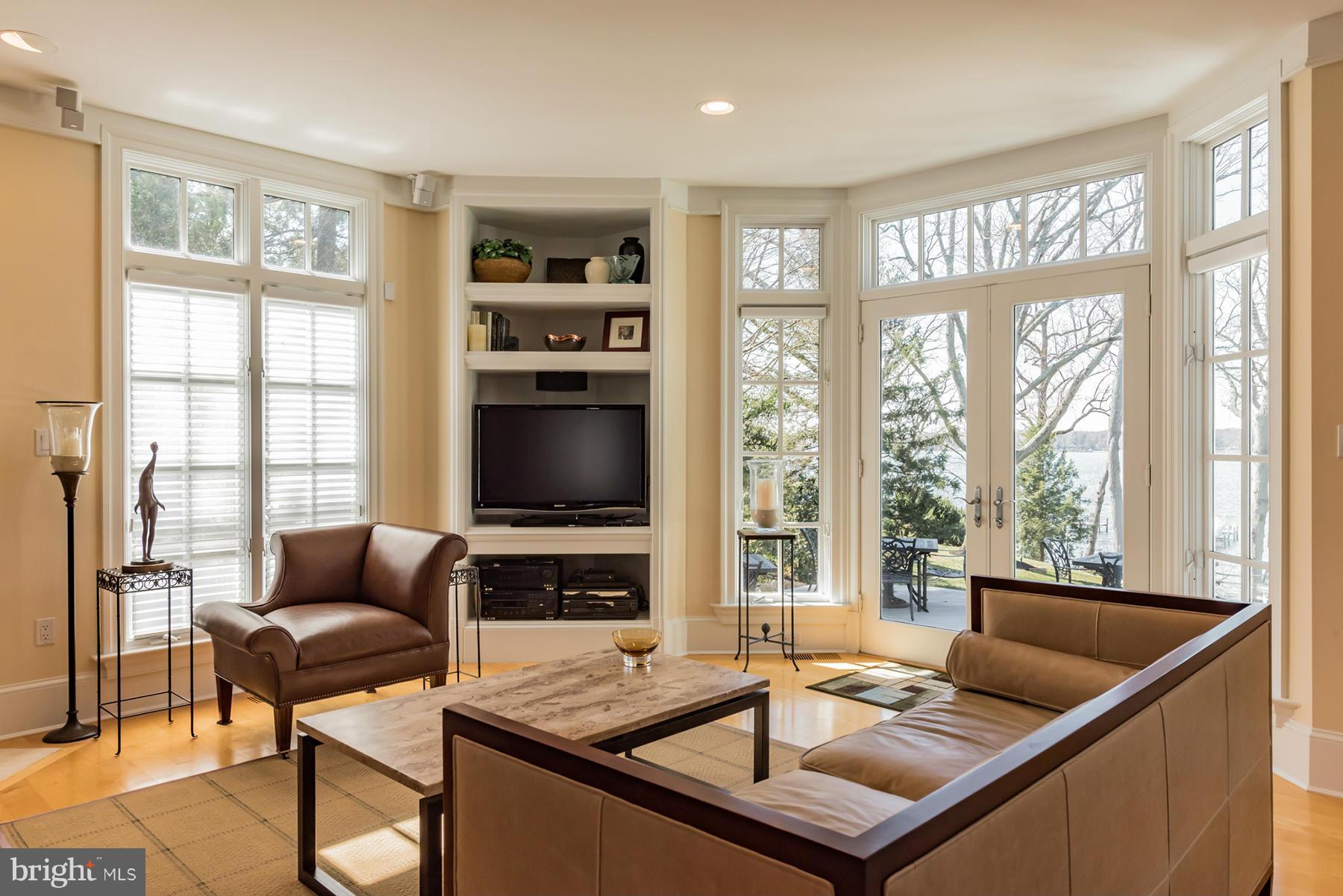 330 North Ferry Point Road Pasadena, MD 21122 - Photo 14 of 30 Family Room has doors to the waterside deck