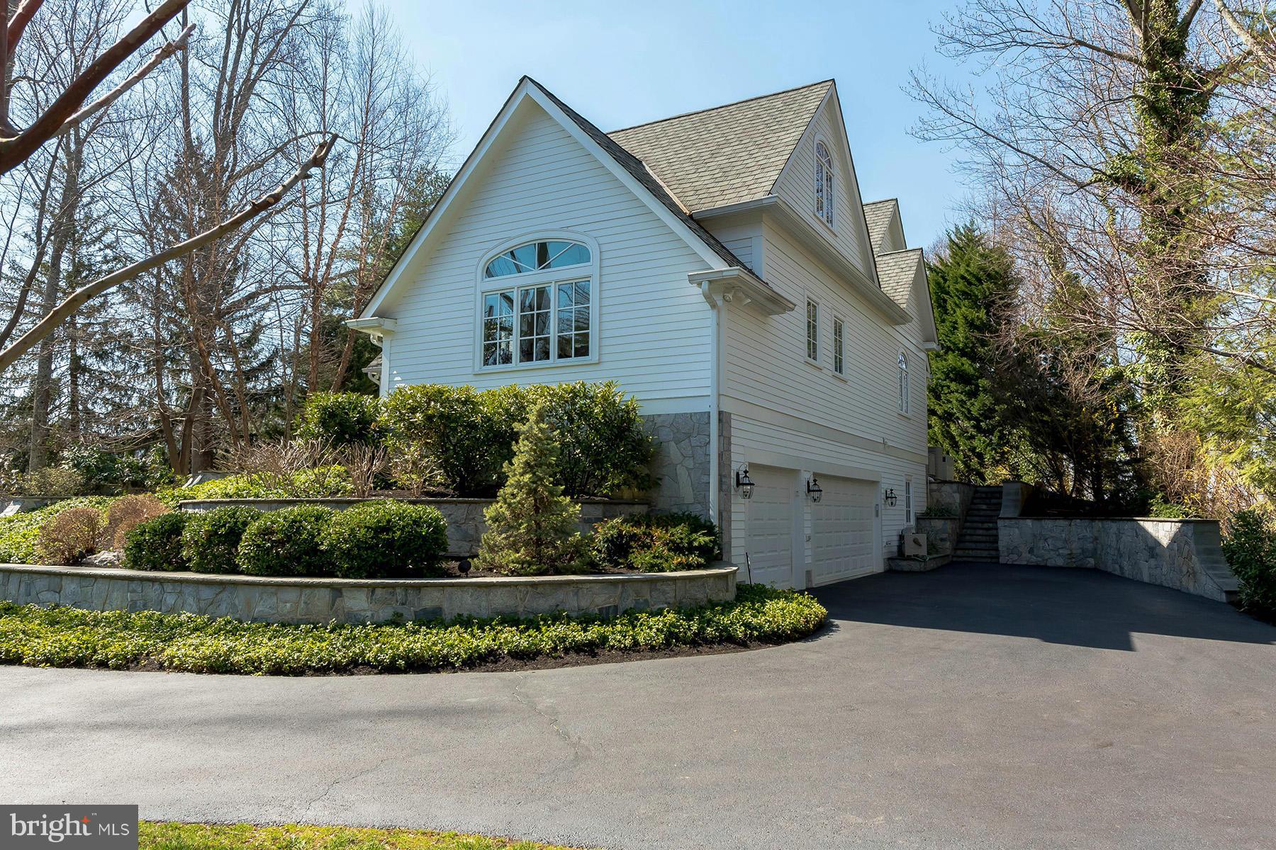 330 North Ferry Point Road Pasadena, MD 21122 - Photo 28 of 30 3 car garage and stone retaining walls