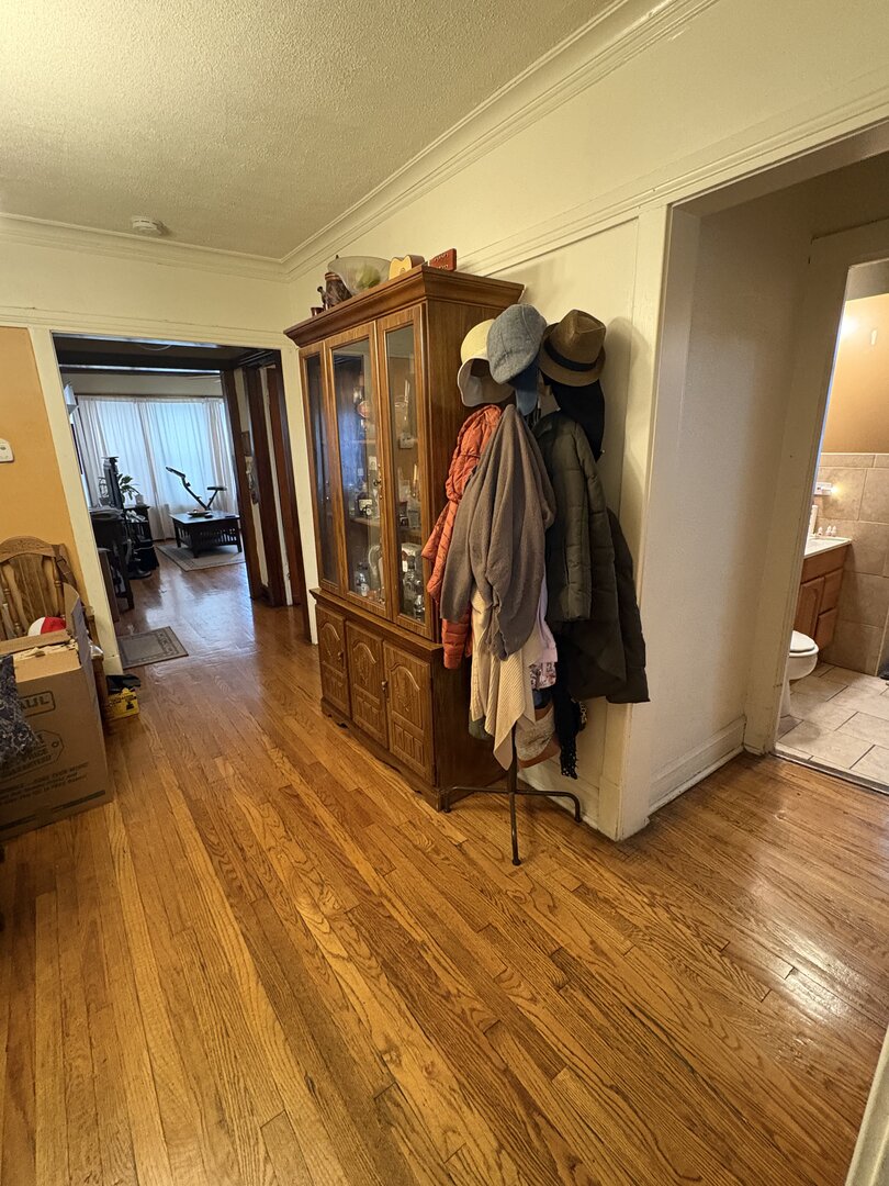 3523 North Whipple Street Chicago, IL 60618 - Photo 23 of 48 a walk in closet with wooden floor