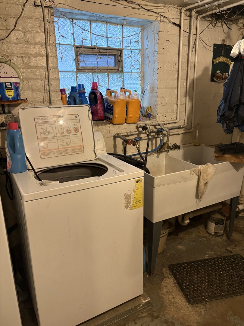 3523 North Whipple Street Chicago, IL 60618 - Photo 25 of 48 a storage room with washer and dryer