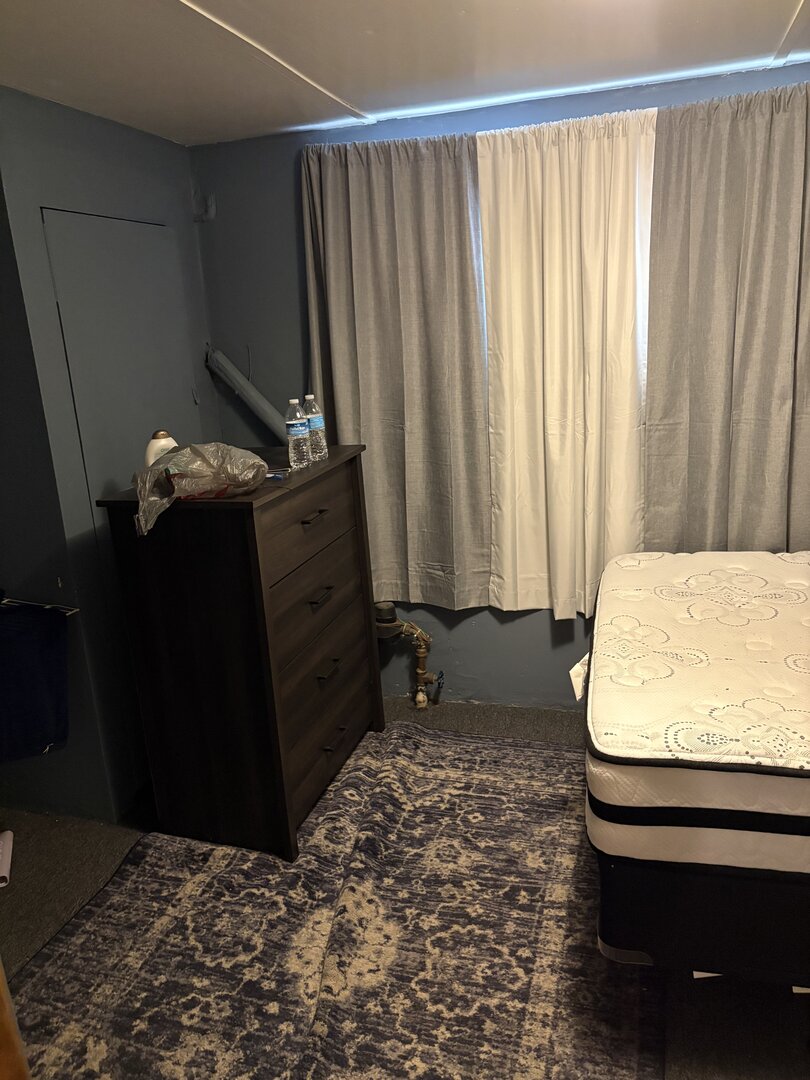 3523 North Whipple Street Chicago, IL 60618 - Photo 27 of 48 a bedroom with a bed and a window