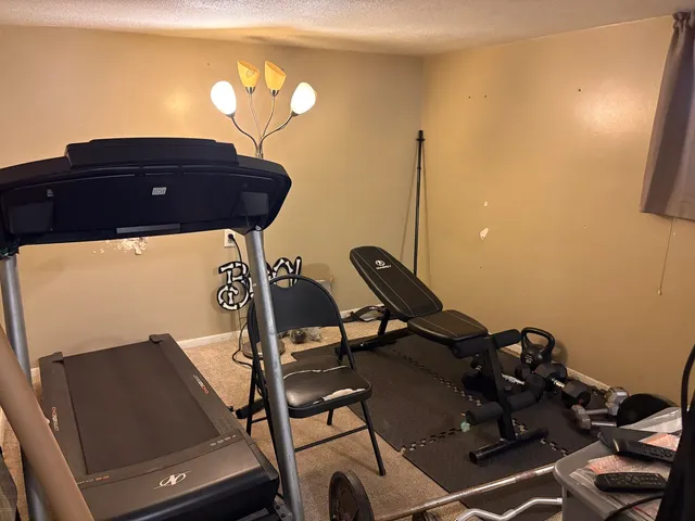 a view of staircase with wooden floor