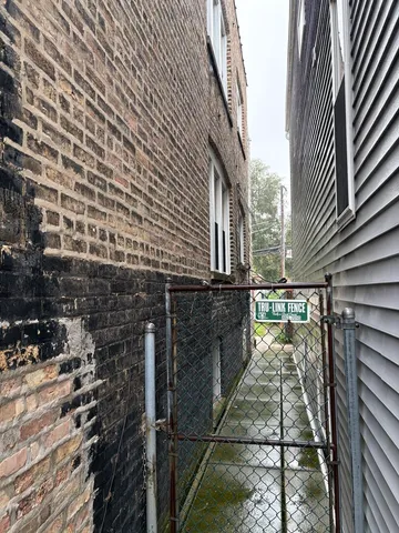 a view of a pathway both side of building