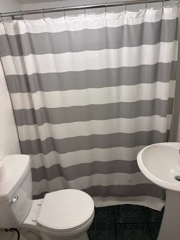 a bathroom with a mirror