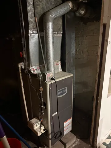 a backyard of a house with seating space