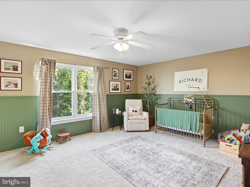 706 East Shore Road Pasadena, MD 21122 - Photo 23 of 32 a bedroom with furniture and a window