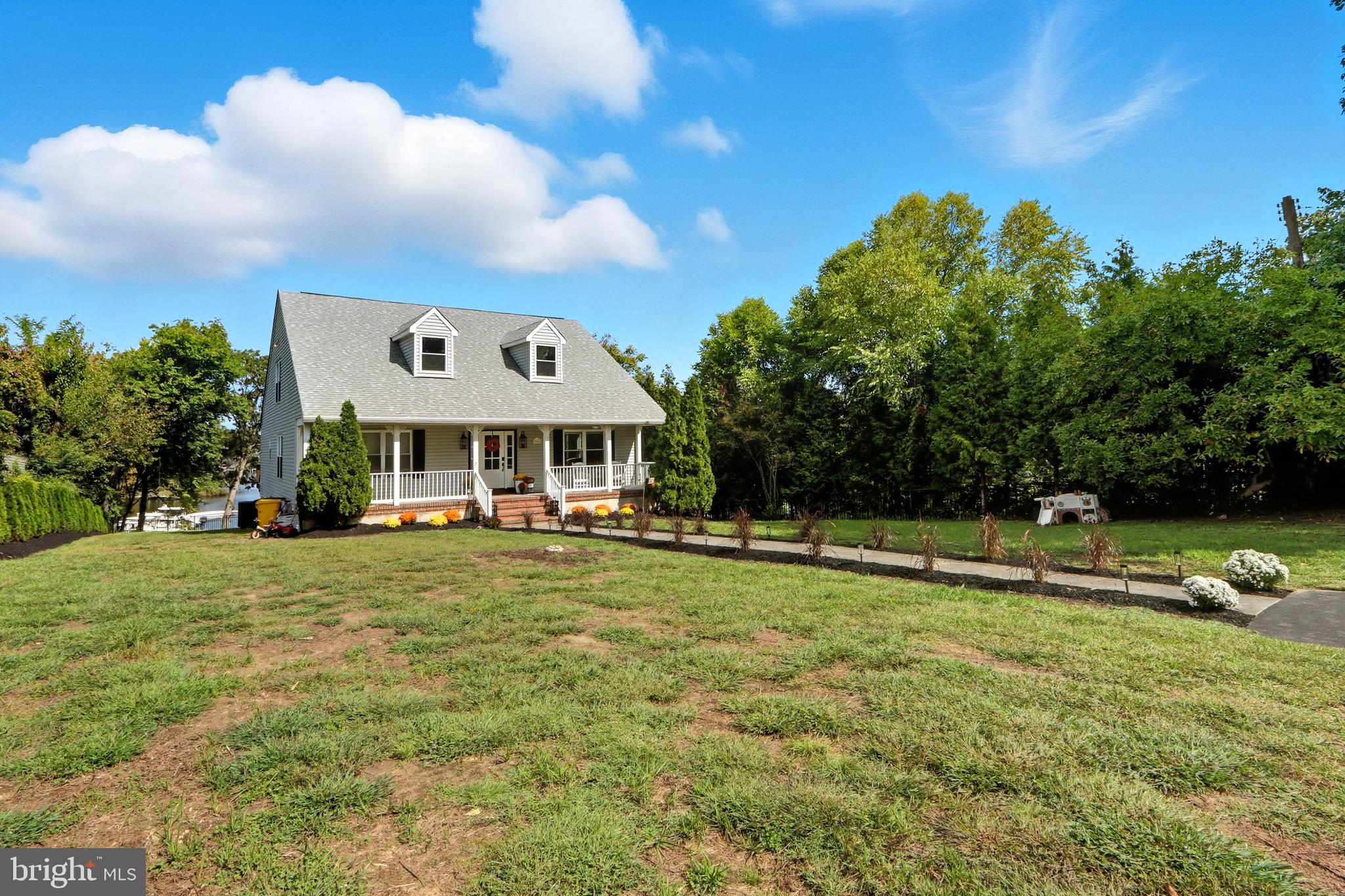 706 East Shore Road Pasadena, MD 21122 - Photo 30 of 32 a front view of a house with a yard
